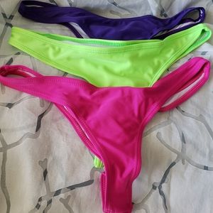 Lot of 3 thong bikini bottoms. Never worn. NWOT